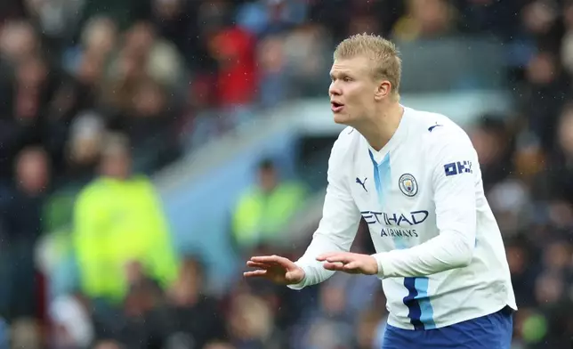 Manchester City's Erling Haaland reacts during the English Premier League soccer match between Aston Villa and Manchester City in Birmingham, England, Saturday, Oct. 24, 2026. (AP Photo/Morgan Harlow)