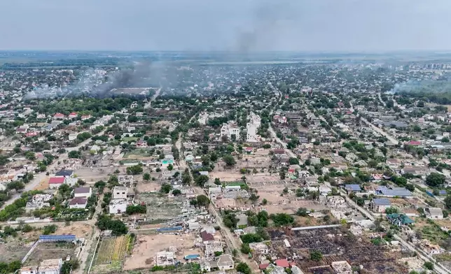 In this undated image from video provided by the Ukrainian 34th Separate Marine Brigade "Borysfen" on Sept. 22, 2026, smoke rises from a residential neighborhood in the Russian-occupied city of Oleshky in the Kherson region of Ukraine. (Ukrainian 34th Separate Marine Brigade "Borysfen" via AP)