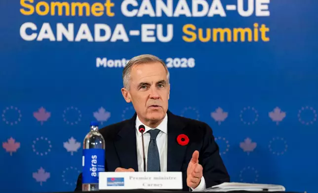 Canada's Prime Minister Mark Carney gives remarks during a roundtable meeting with business leaders during the Canada-EU Summit in Montreal, Thursday, Oct. 29, 2026. (Christopher Katsarov/The Canadian Press via AP)