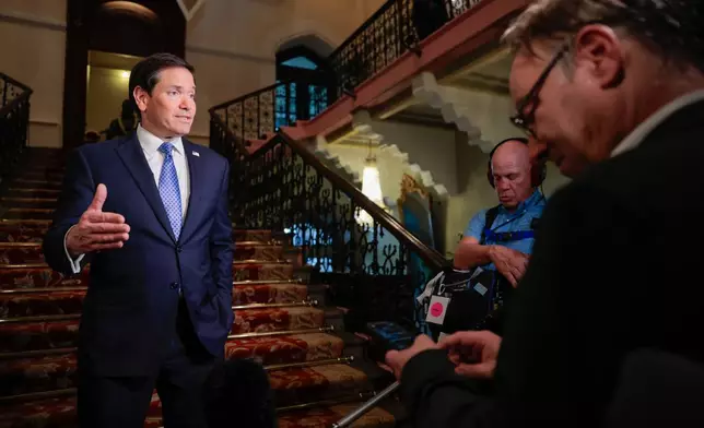 US Secretary of State Marco Rubio speaks to the media upon his arrival at the Taj Mahal Palace Hotel in Mumbai, India, Tuesday, Oct. 20, 2026. (Kylie Cooper/Pool Photo via AP)