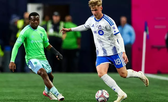 CF Montréal midfielder Hennadii Synchuk (18) makes a pass during the first half of an MLS soccer match against the Seattle Sounders, Saturday, Oct. 17, 2026, in Seattle. (AP Photo/Rio Giancarlo)