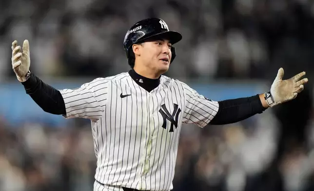 New York Yankees' Anthony Volpe celebrates his run-scoring double during the sixth inning in Game 3 of baseball's American League Division Series against the Tampa Bay Rays, Wednesday, Oct. 7, 2026, in New York. (AP Photo/Seth Wenig)
