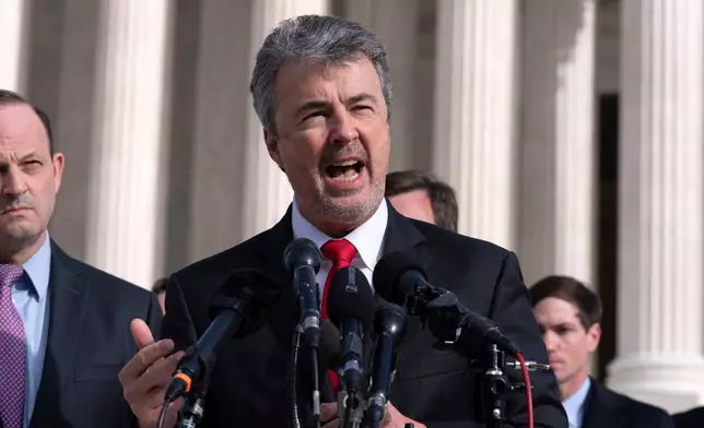 FILE - Alabama Attorney General Steve Marshall talks to reporters outside of the Supreme Court, Dec. 4, 2024, in Washington. (AP Photo/Jose Luis Magana, File)