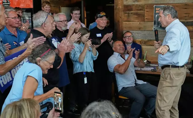 FILE - Supporters applaud as Democratic Ohio Senate candidate Sherrod Brown, a former three-term U.S. senator, speaks at a campaign event in Akron, Ohio, on July 16, 2026. (AP Photo/Sue Ogrocki, File)