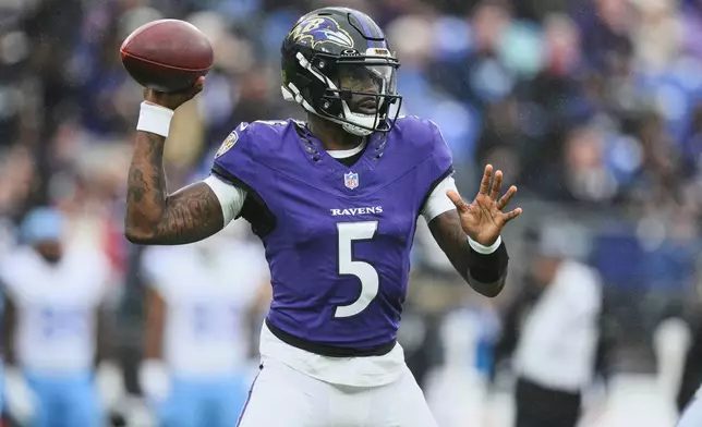 Baltimore Ravens quarterback Tyler Huntley (5) looks to throw a pass during the second half of an NFL football game against the Tennessee Titans in Baltimore, Sunday, Oct. 4, 2026. (AP Photo/Nick Wass)
