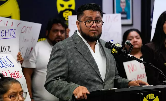 Cesar Espinosa of FIEL speaks during a news conference at FIEL headquarters in Houston on Friday, Oct. 16, 2026, disputing Immigration and Customs Enforcement's account of the Oct. 10 enforcement action that left Miguel Parra with a broken leg. (Raquel Natalicchio /Houston Chronicle via AP)