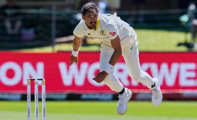 Australia's Mitchell Starc bowls on day three of the second cricket test match between South Africa and Australia, in Gqeberha, South Africa, Tuesday, Oct. 20, 2026. (AP Photo/Themba Hadebe)