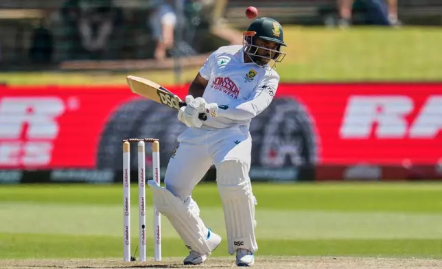 South Africa's captain Temba Bavuma evades a ball on day three of the second cricket test match between South Africa and Australia, in Gqeberha, South Africa, Tuesday, Oct. 20, 2026. (AP Photo/Themba Hadebe)