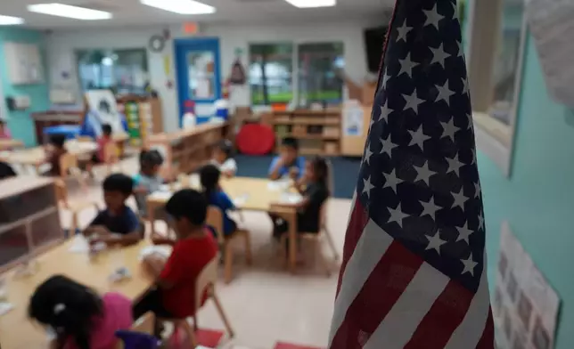An American flag stands in a classroom at a Head Start preschool in Immokalee, Fla., Thursday, Sept. 10, 2026. (AP Photo/Rebecca Blackwell)