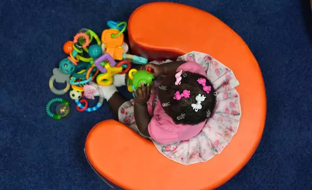 A young girl plays in a classroom at a Head Start preschool in Immokalee, Fla., Thursday, Sept. 10, 2026. (AP Photo/Rebecca Blackwell)