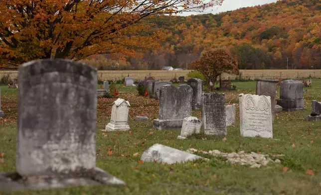 Gravestones in the Rupert Street Cemetery in Rupert, Vt., are pictured Wednesday, Oct. 14, 2026. (AP Photo/Amanda Swinhart)
