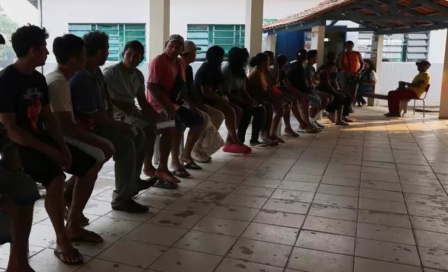 FILE - Members of the Mura Indigenous community line up to vote in the presidential runoff in Autazes, Amazonas state, Brazil, Oct. 25, 2026. (AP Photo/Edmar Barros)