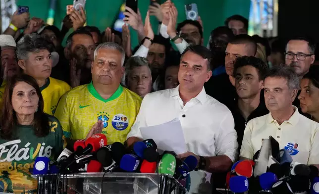 FILE - Opposition presidential candidate Sen. Flavio Bolsonaro speaks after the presidential election runoff in Brasilia, Brazil, Oct. 25, 2026. (AP Photo/Eraldo Peres, File)