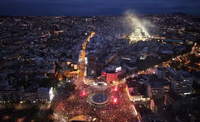 People take part in the final "Student List – Students Win" rally ahead of a parliamentary election in Belgrade, Serbia, Thursday, Oct. 22, 2026. (AP Photo/Armin Durgut)