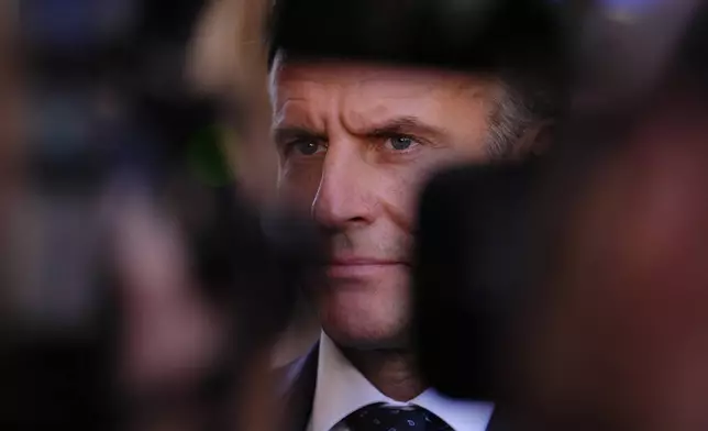 French President Emmanuel Macron addresses the media in Marseille, France, Monday, Oct. 26, 2026. (AP Photo/Aurelien Morissard, Pool)