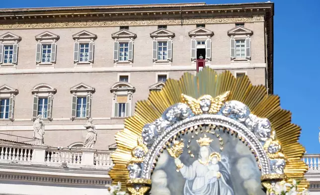 Pope Leo XIV delivers the Angelus prayer in St. Peter's Square at the Vatican, Sunday, Oct. 11, 2026. (AP Photo/Gregorio Borgia)