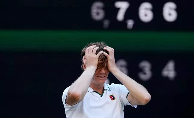 FILE - Jannik Sinner of Italy reacts after winning against Alexander Zverev of Germany in the men's singles final at Wimbledon Tennis Championships in London, Sunday, July 12, 2026. (AP Photo/Kirsty Wigglesworth, File)
