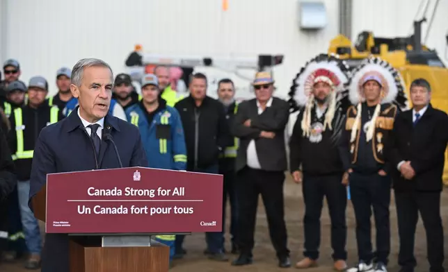 Prime Minister Mark Carney speaks during a news conference in Fort McMurray, Alberta, Canada, on Thursday, Oct. 1, 2026, regarding the Pacific Link pipeline project. (Greg Halinda/The Canadian Press via AP)
