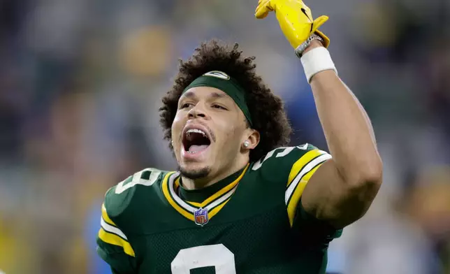 Green Bay Packers wide receiver Christian Watson celebrates on the field after an NFL football game against the Carolina Panthers in Green Bay, Wis., Thursday, Oct. 29, 2026. (AP Photo/Matt Ludtke)