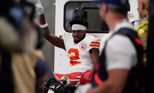 Kansas City Chiefs wide receiver Tyquan Thornton (2) waves as he is carted off the field after an injury during the second half of an NFL football game against the Las Vegas Raiders in Las Vegas, Sunday, Oct. 4, 2026. (AP Photo/John Locher)