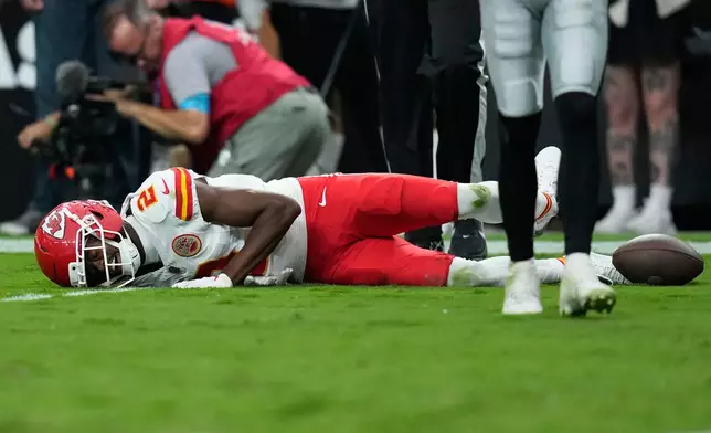 Kansas City Chiefs wide receiver Tyquan Thornton (2) lies on the field after an injury during the second half of an NFL football game Las Vegas Raiders in Las Vegas, Sunday, Oct. 4, 2026. (AP Photo/John Locher)