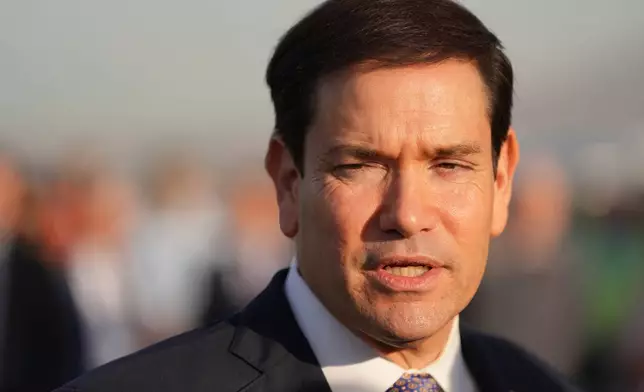 U.S. Secretary of State Marco Rubio speaks to the press before boarding a plane at Eleftherios Venizelos International Airport near Athens, Greece, Thursday, Oct. 8, 2026. (AP Photo/Mark Schiefelbein, Pool)
