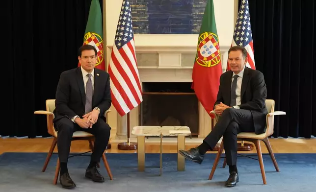 U.S. Secretary of State Marco Rubio, left, meets with Portugal's Prime Minister Luis Montenegro, Thursday, Oct. 8, 2026, at the Sao Bento Palace in Lisbon. (AP Photo/Mark Schiefelbein, Pool)
