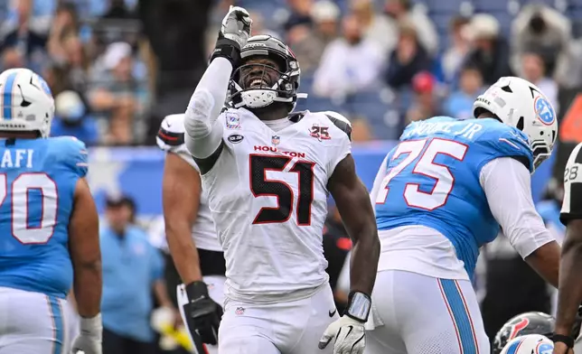 Houston Texans defensive end Will Anderson Jr. (51) celebrates after sacking Tennessee Titans quarterback Cam Ward during the second half of an NFL football game in Nashville, Tenn., Sunday, Oct. 11, 2026. (AP Photo/John Amis)