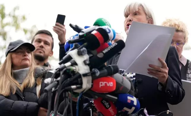 Mirjana Nikolic, right, rector of the University of Arts, speaks during a news conference by Serbia's student movement demanding the resignations of top police and security officials in Belgrade, Serbia, Thursday, Oct. 29, 2026. (AP Photo/Darko Vojinovic)