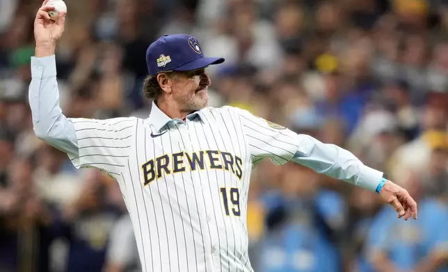 Baseball hall of famer Robin Yount waves prior to Game 1 of baseball's World Series, Friday, Oct. 23, 2026, in Milwaukee, between the Milwaukee Brewers and the Tampa Bay Rays. (AP Photo/Kayla Wolf)