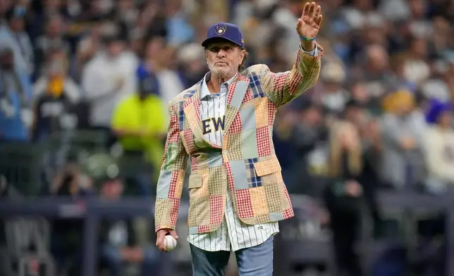 Baseball hall of famer Robin Yount waves prior to Game 1 of baseball's World Series, Friday, Oct. 23, 2026, in Milwaukee, between the Milwaukee Brewers and the Tampa Bay Rays. (AP Photo/Ashley Landis)