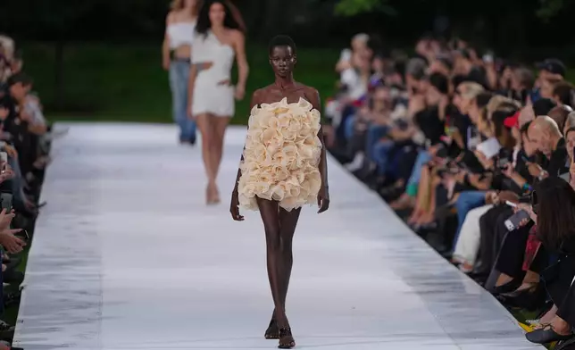 A model wears a creation as part of the Stella McCartney Womenswear Spring Summer 2027 collection presented in Paris, France, Wednesday, Sept. 30, 2026. (AP Photo/Aurelien Morissard)