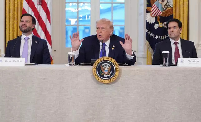 FILE - President Donald Trump , flanked by Vice President JD Vance, left, and Secretary of State Marco Rubio, speaks during a meeting with oil executives in the East Room of the White House, Jan. 9, 2026, in Washington. (AP Photo/Evan Vucci, File)