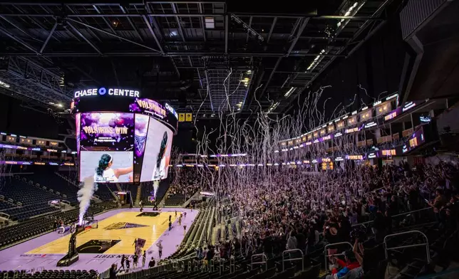 Streamers fall from the rafters following the Golden State Valkyries victory over the Atlanta Dream in Game 4 of the WNBA basketball finals against the Atlanta Dream, Saturday, Oct. 24, 2026, in Atlanta. (Dan Hernandez/San Francisco Chronicle via AP)