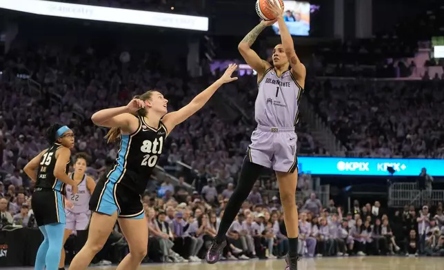 Golden State Valkyries forward Gabby Williams (1) shoots against Atlanta Dream guard Isobel Borlase (20) during the first half of Game 5 of the WNBA basketball finals, Monday, Oct. 26, 2026, in San Francisco. (AP Photo/Jeff Chiu)