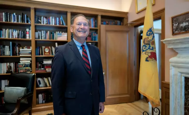 Associate Justice Samuel Alito stands in his chambers at the Supreme Court during an Associated Press interview, in Washington, Tuesday, Sept. 29, 2026. (AP Photo/J. Scott Applewhite)