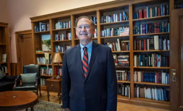 Associate Justice Samuel Alito stands in his chambers at the Supreme Court during an Associated Press interview, in Washington, Tuesday, Sept. 29, 2026. (AP Photo/J. Scott Applewhite)