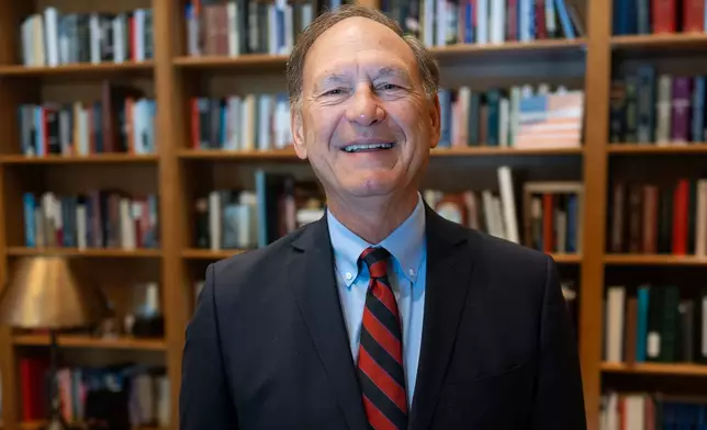 Associate Justice Samuel Alito stands in his chambers at the Supreme Court during an Associated Press interview, in Washington, Tuesday, Sept. 29, 2026. (AP Photo/J. Scott Applewhite)