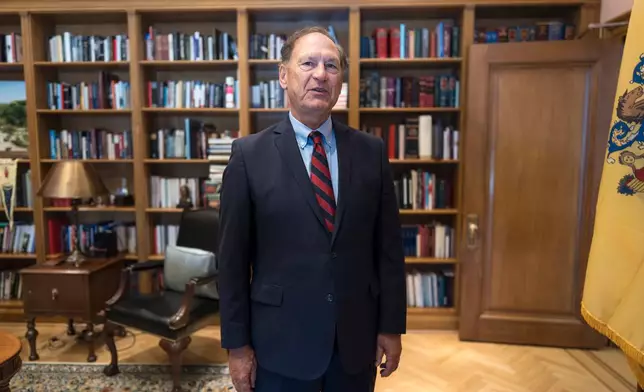 Associate Justice Samuel Alito stands in his chambers at the Supreme Court during an Associated Press interview, in Washington, Tuesday, Sept. 29, 2026. (AP Photo/J. Scott Applewhite)