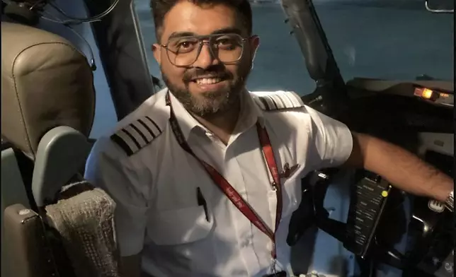 This undated photo released on Israel's Foreign Ministry social media shows Indian Capt. Smit Machchhar in the cockpit of a plane in an unknown location. Machchhar was at the controls of a FlyDubai flight that was diverted to Tabuk in northwestern Saudi Arabia for an emergency landing on Wednesday, Sept. 30, 2026. (Israel's Foreign Ministry via AP)
