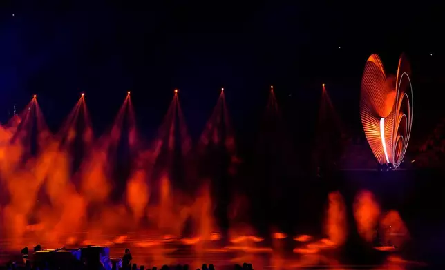 The cauldron is seen during the closing ceremony for the Asian Games in Nagoya, Japan, Sunday, Oct. 4, 2026. (AP Photo/Eugene Hoshiko)