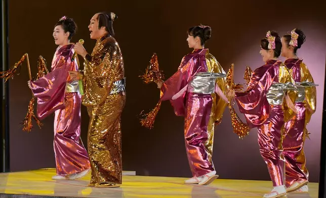 Ken Matsudaira performs during the closing ceremony for the Asian Games in Nagoya, Japan, Sunday, Oct. 4, 2026. (AP Photo/Eugene Hoshiko)
