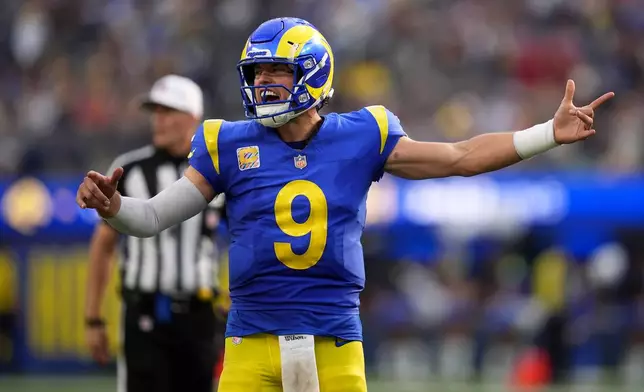 Los Angeles Rams quarterback Matthew Stafford (9) reacts toward teammates during the second half of an NFL football game against the Arizona Cardinals in Inglewood, Calif., Sunday, Oct. 18, 2026. (AP Photo/Gregory Bull)