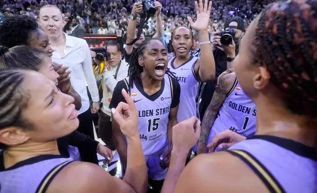 Golden State Valkyries guard Tiffany Hayes (15) celebrates with teammates after Game 3 of a WNBA basketball first-round playoff series against the Dallas Wings, Friday, Oct. 2, 2026, in San Francisco. (AP Photo/Jeff Chiu)