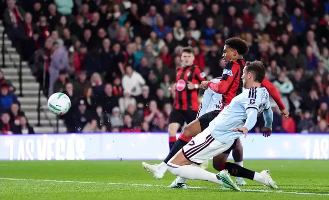 Bournemouth's Amine Adli, second from right, scores their side's first goal of the game during an English League Cup soccer match between Bournemouth and Aston Villa, Wednesday, Oct. 28, 2026, in Bournemouth, England. (Adam Davy/PA via AP)