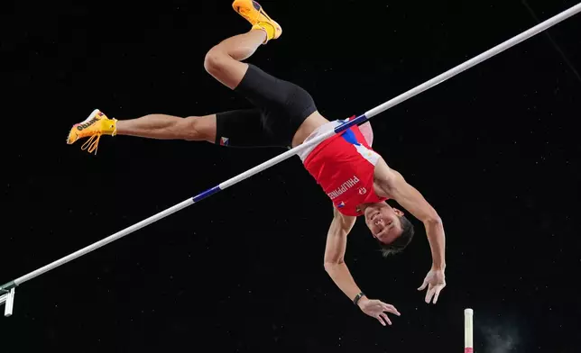 Philippines' Ernest John Obiena competes in the men's pole vault final at the Asian Games in Nagoya, Japan, Tuesday, Sept. 29, 2026. (AP Photo/Aaron Favila)