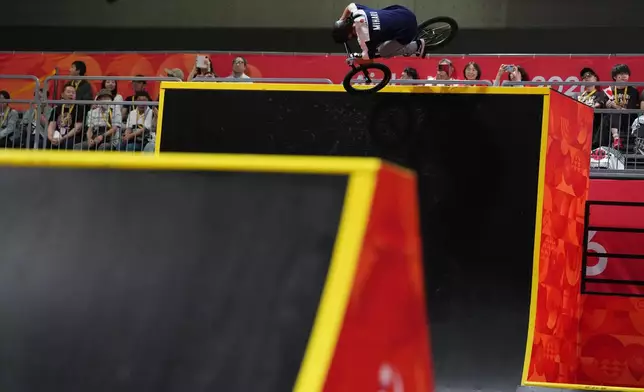 Japan's Miharu Ozawa competes at the women's cycling BMX freestyle final at the Asian Games in Nagoya, Japan, Sunday, Sept. 27, 2026. (AP Photo/Aaron Favila)