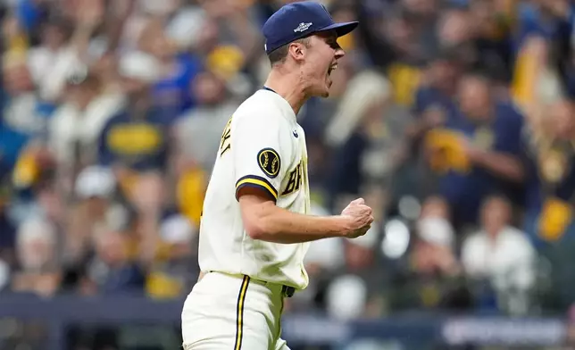 Milwaukee Brewers pitcher Jacob Misiorowski celebrates the end of the fourth innning of Game 1 of baseball's National League Championship Series between the Milwaukee Brewers and the Los Angeles Dodgers, Sunday, Oct. 11, 2026, in Milwaukee. (AP Photo/Abbie Parr)