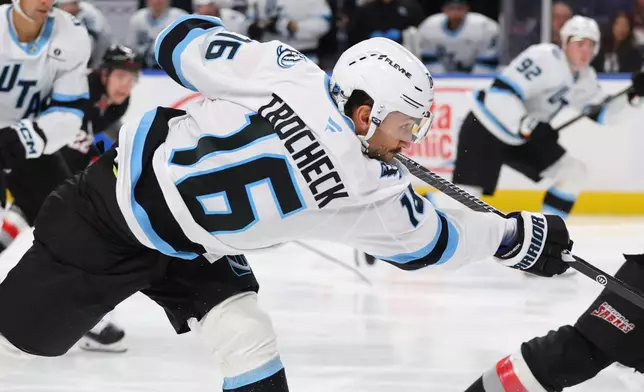 Utah Mammoth center Vincent Trocheck (16) takes a shot during the second period of an NHL hockey game against the Buffalo Sabres Saturday, Oct. 10, 2026, in Buffalo, N.Y. (AP Photo/Jeffrey T. Barnes)