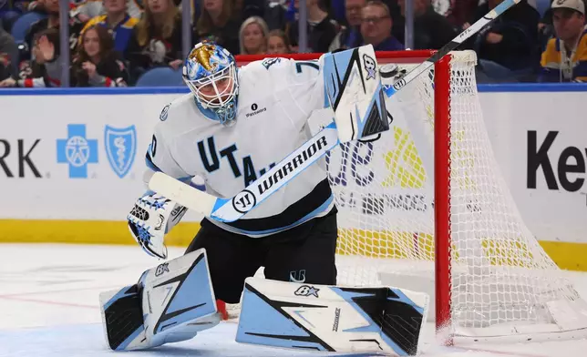 Utah Mammoth goaltender Karel Vejmelka (70) makes a save during the first period of an NHL hockey game against the Buffalo Sabres Saturday, Oct. 10, 2026, in Buffalo, N.Y. (AP Photo/Jeffrey T. Barnes)
